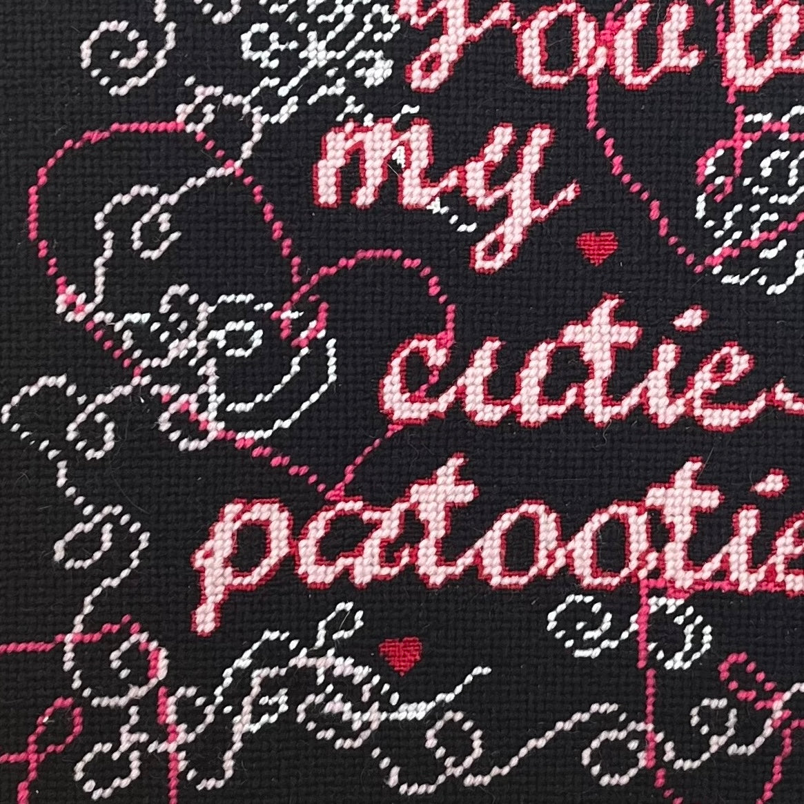 hand-embroidered needlepoint CUTIE-PATOOTIE pillow