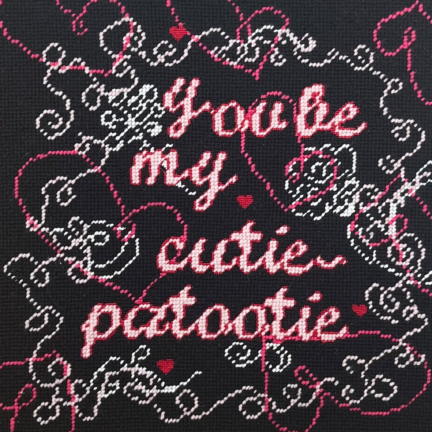 hand-embroidered needlepoint CUTIE-PATOOTIE pillow