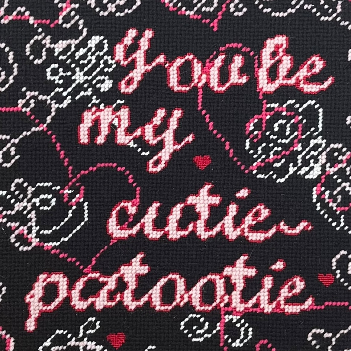 hand-embroidered needlepoint CUTIE-PATOOTIE pillow