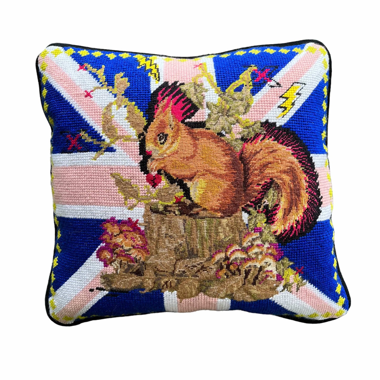 squirrel with hot pink mohawk sits on a tree stump, surrounded by mushrooms and British flag