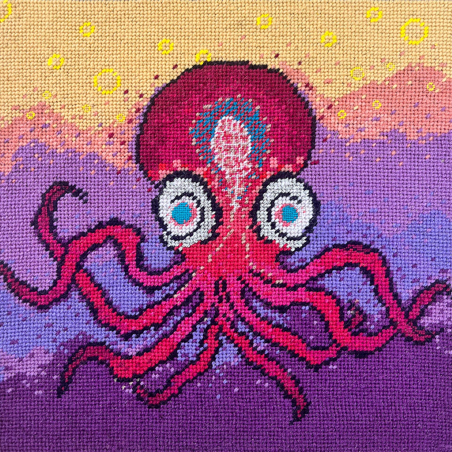 Harry Heissmann x Mommani Threads hand-embroidered OCTI needlepoint pillow