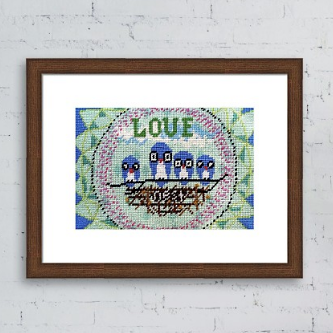 blue owls sit on next with pink circle and blue-green sun elements behind them