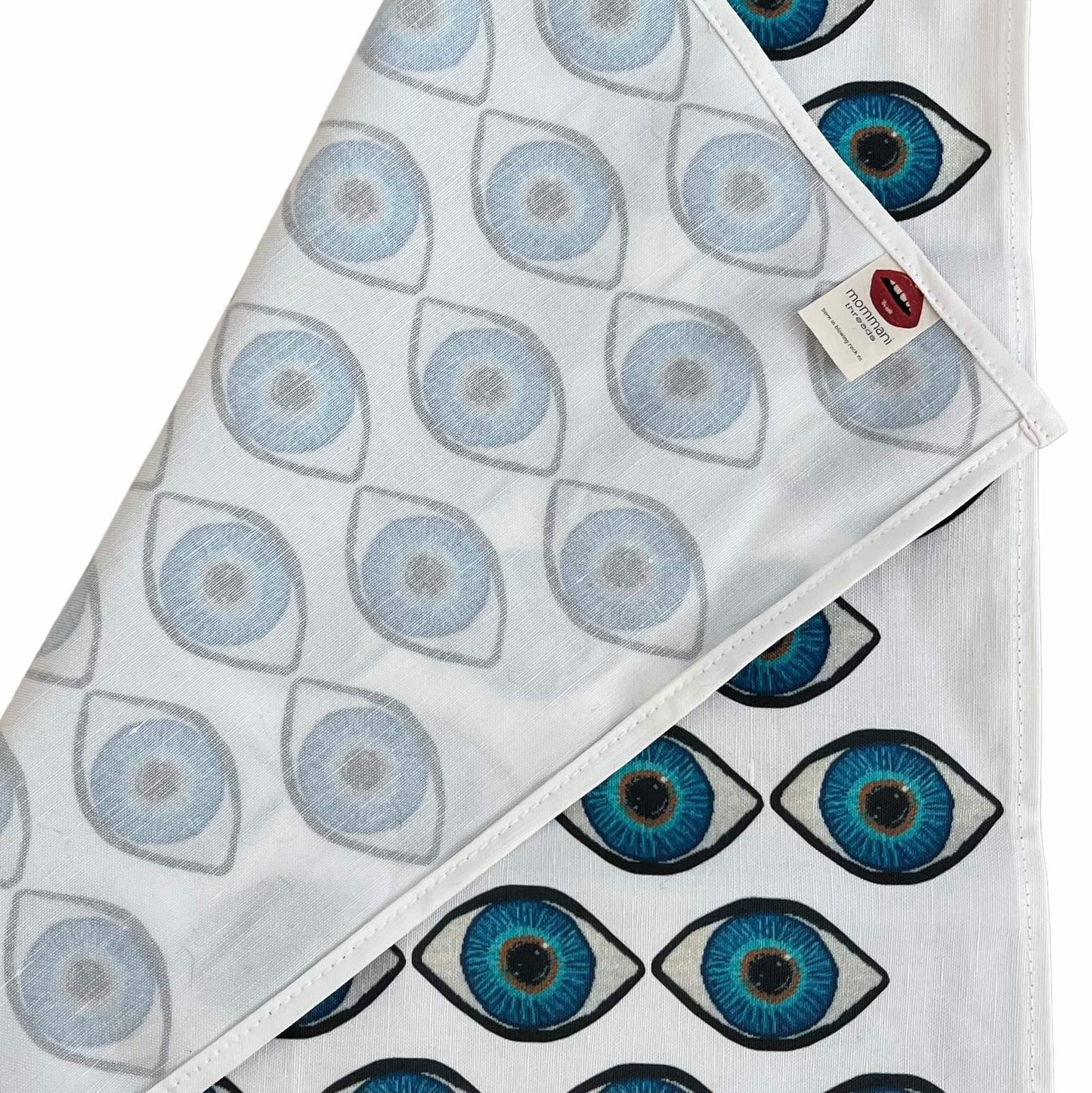 tea towel covered in blue eyes