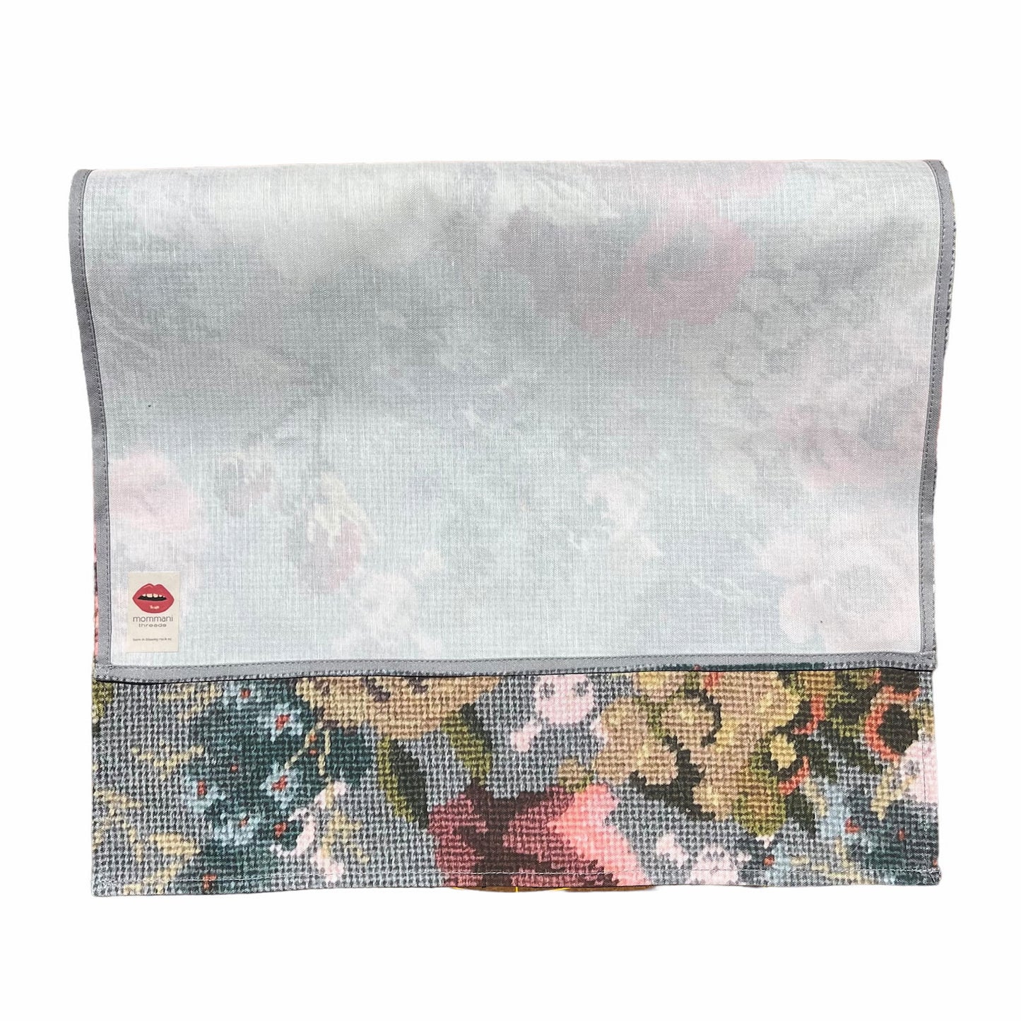 English roses smattered on a grey background with baby pink skulls & crossbones