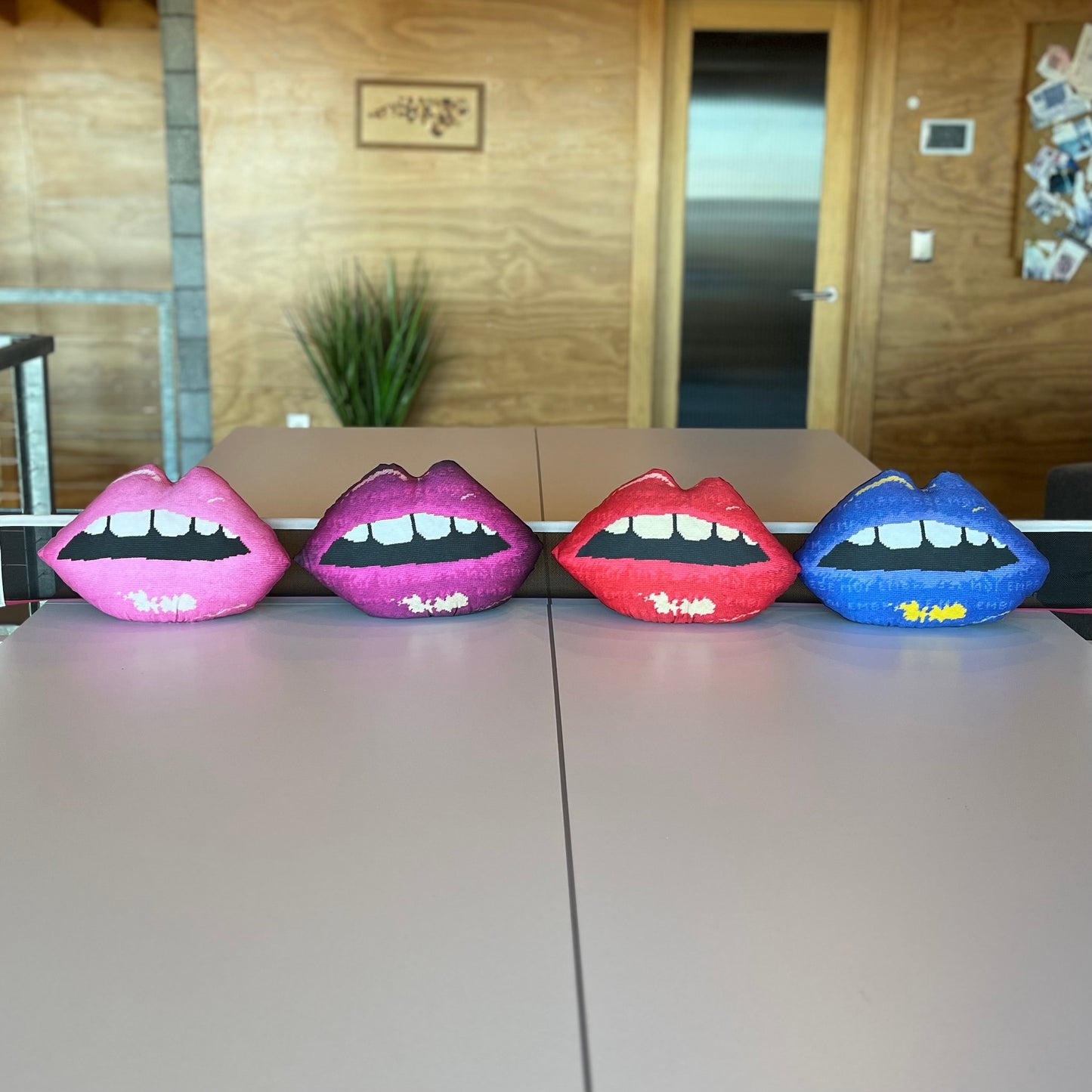 Set of 4 sculpted lips pillow in pink, blue, magenta open mouth & gapped teeth. Featured on Disney+ High School Musical The Series.