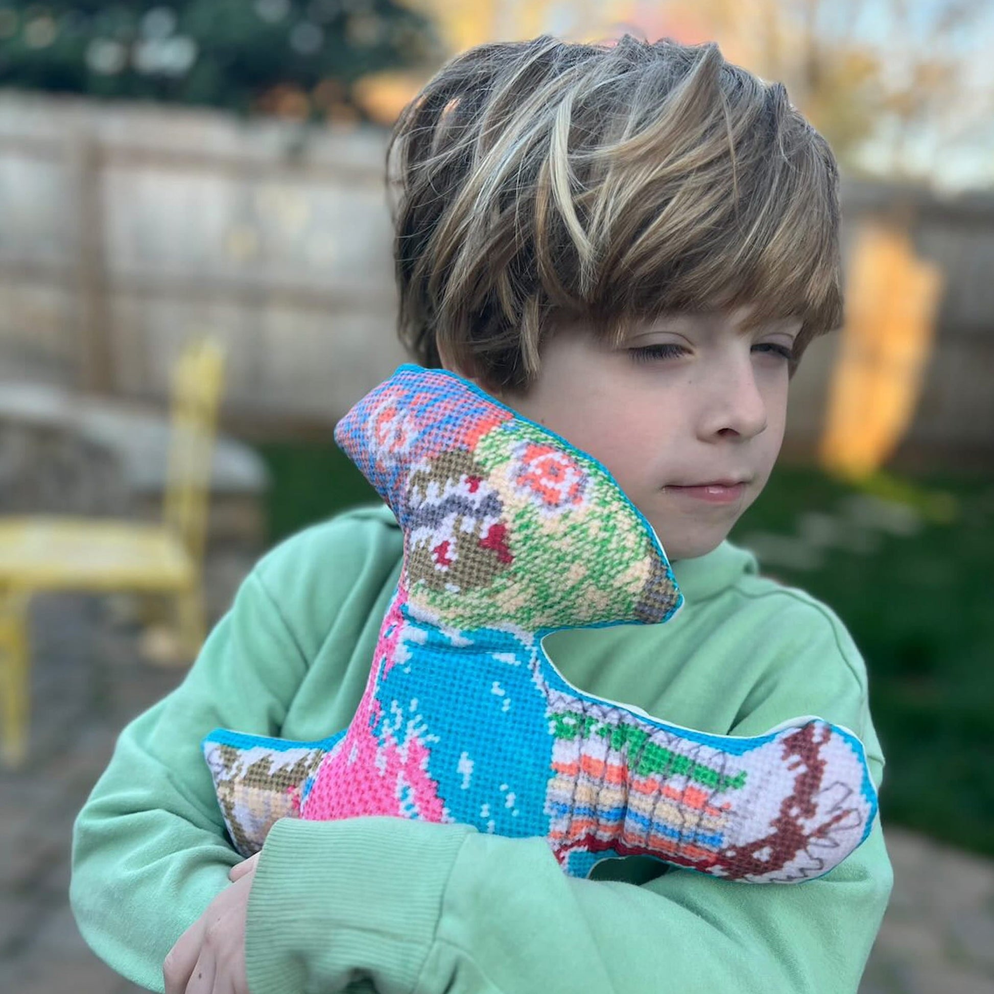 colorful, silly sculpted soft plush monster