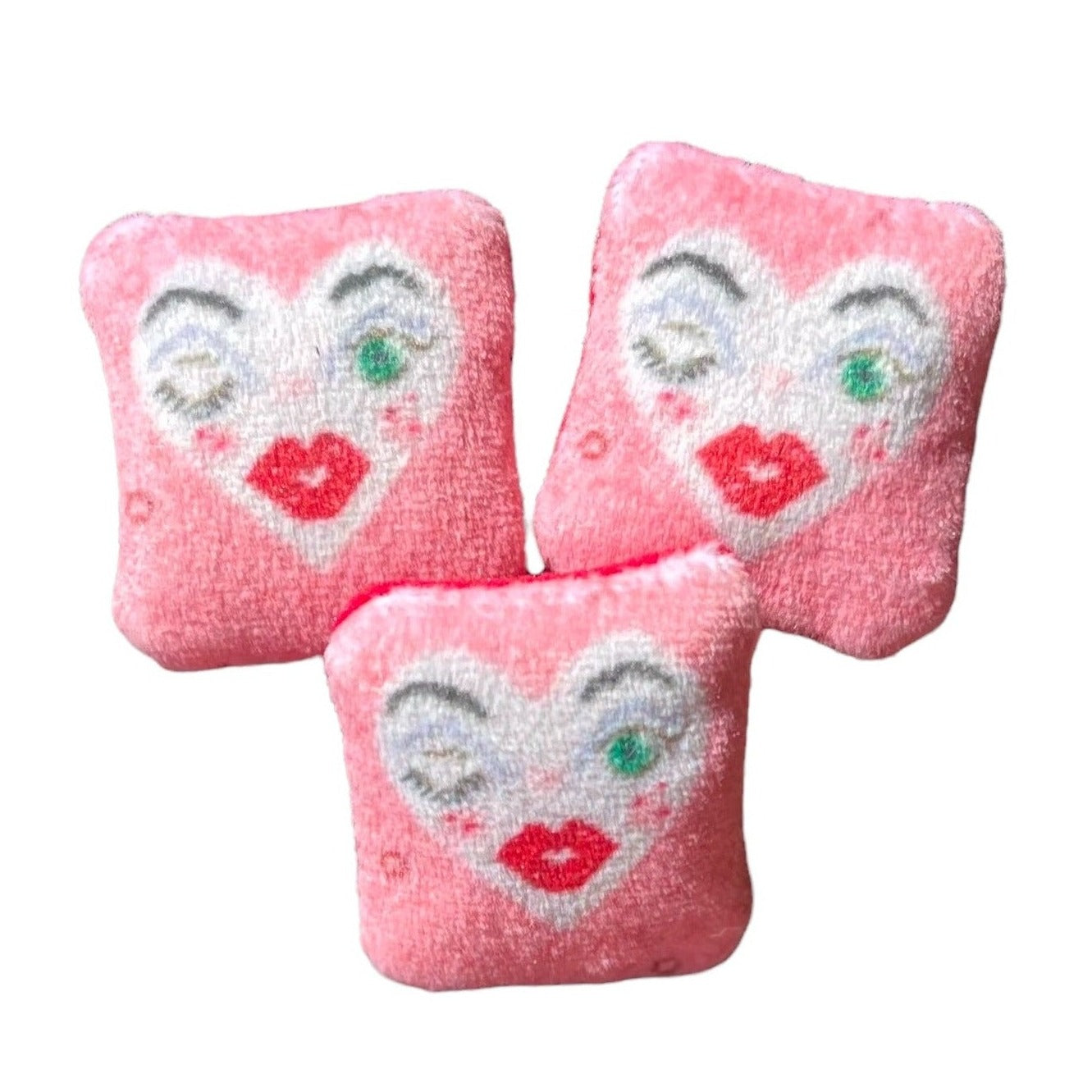 pink velvet lavender sachet with with heart face, winking, green eye & full lips