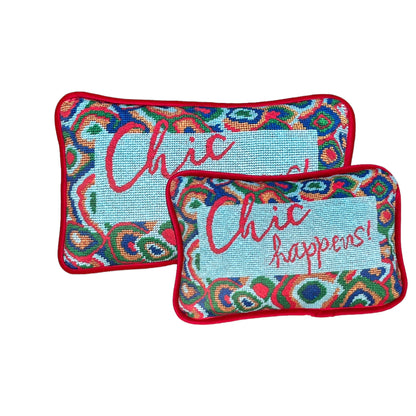 designer velvet pillow reads "Chic Happens" in red on Tiffany blue background with colorful red, green and blue  large paisley border