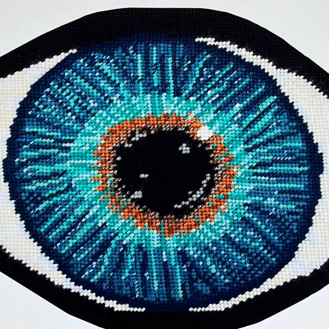 blue eye print has gold in center, turning to turquoise, then deep blues - very detailed