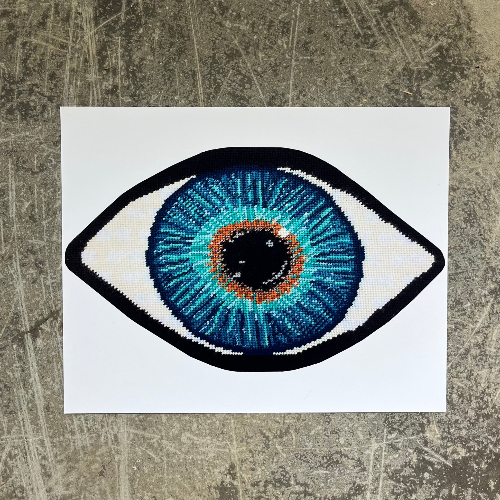 blue eye print has gold in center, turning to turquoise, then deep blues - very detailed