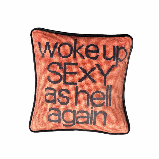 woke up sexy as hell in black, centered on pillow with copper background