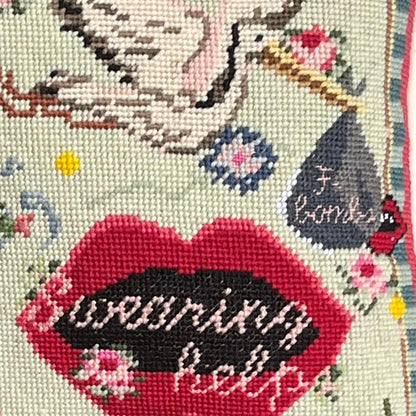 hand-embroidered needlepoint F-BOMB (SWEARING HELPS)