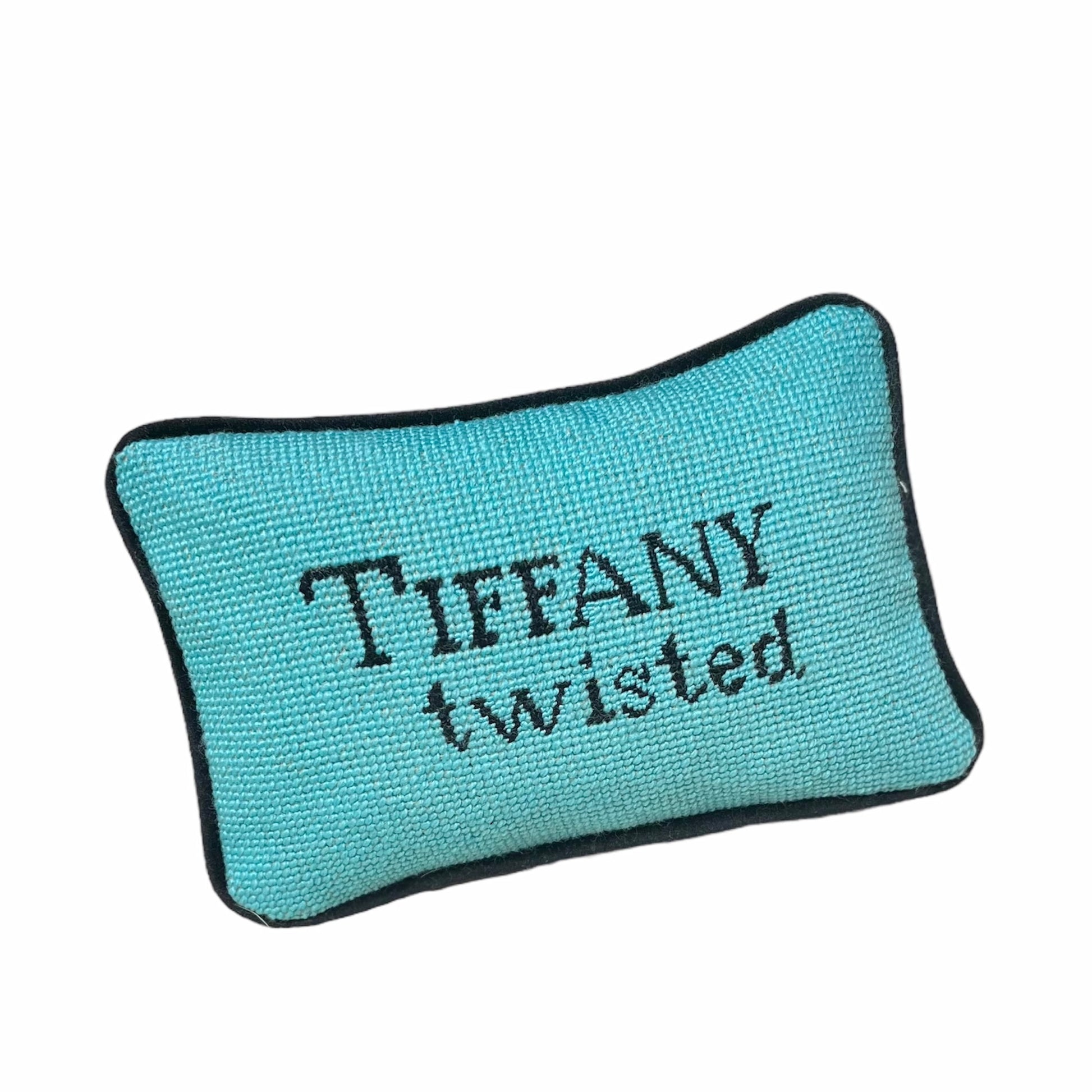 needlepoint Tiffany colored pillow reads "Tiffany Twisted" in black silk.  One of a kind pillow.