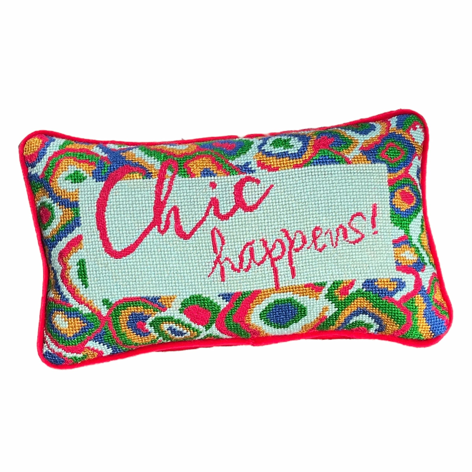 hand-embroidered needlepoint pillow features red, green, blue & gold paisley border with "Chic Happens!" written in red in the center