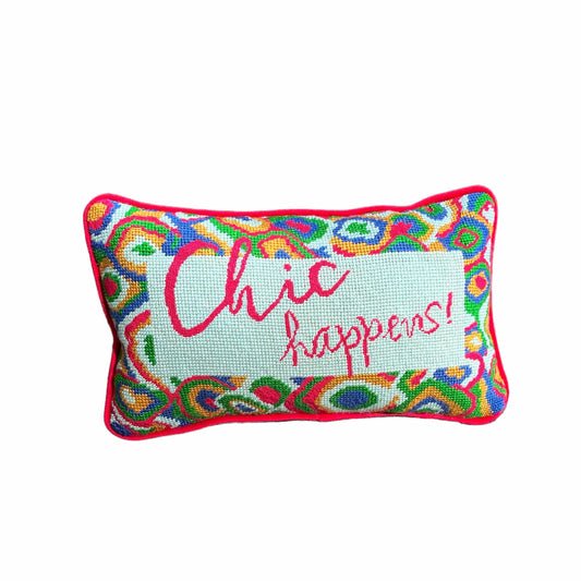 hand-embroidered needlepoint pillow features red, green, blue & gold paisley border with "Chic Happens!" written in red in the center
