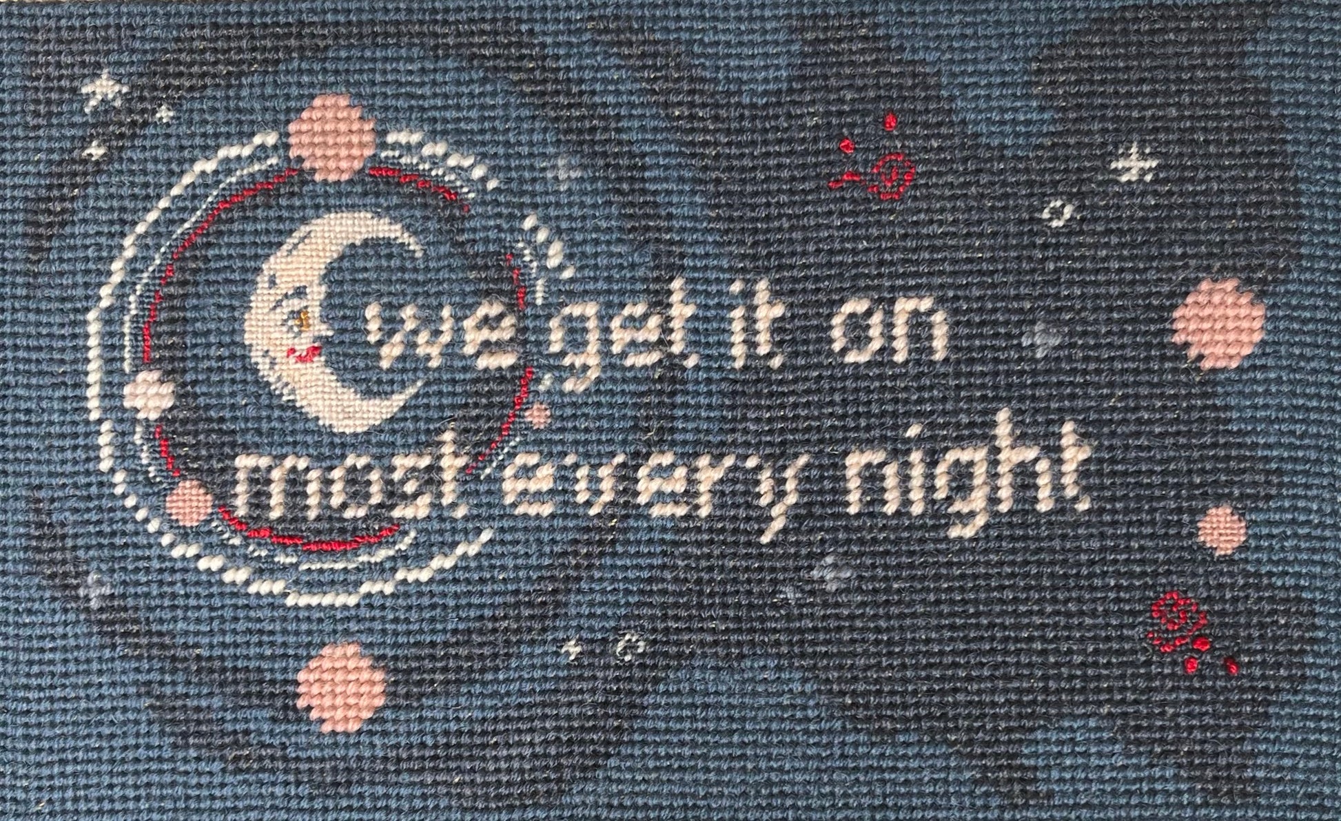 detailed crescent moon with text reading "we get it on most every night" with stars and planets, night time blue shading