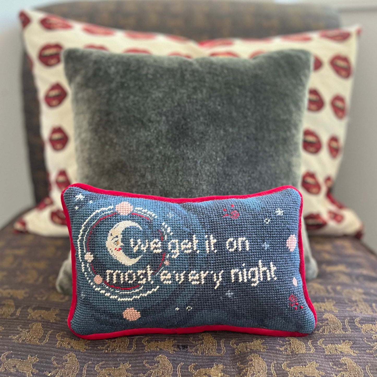 detailed crescent moon with text reading "we get it on most every night" with stars and planets, night time blue shading