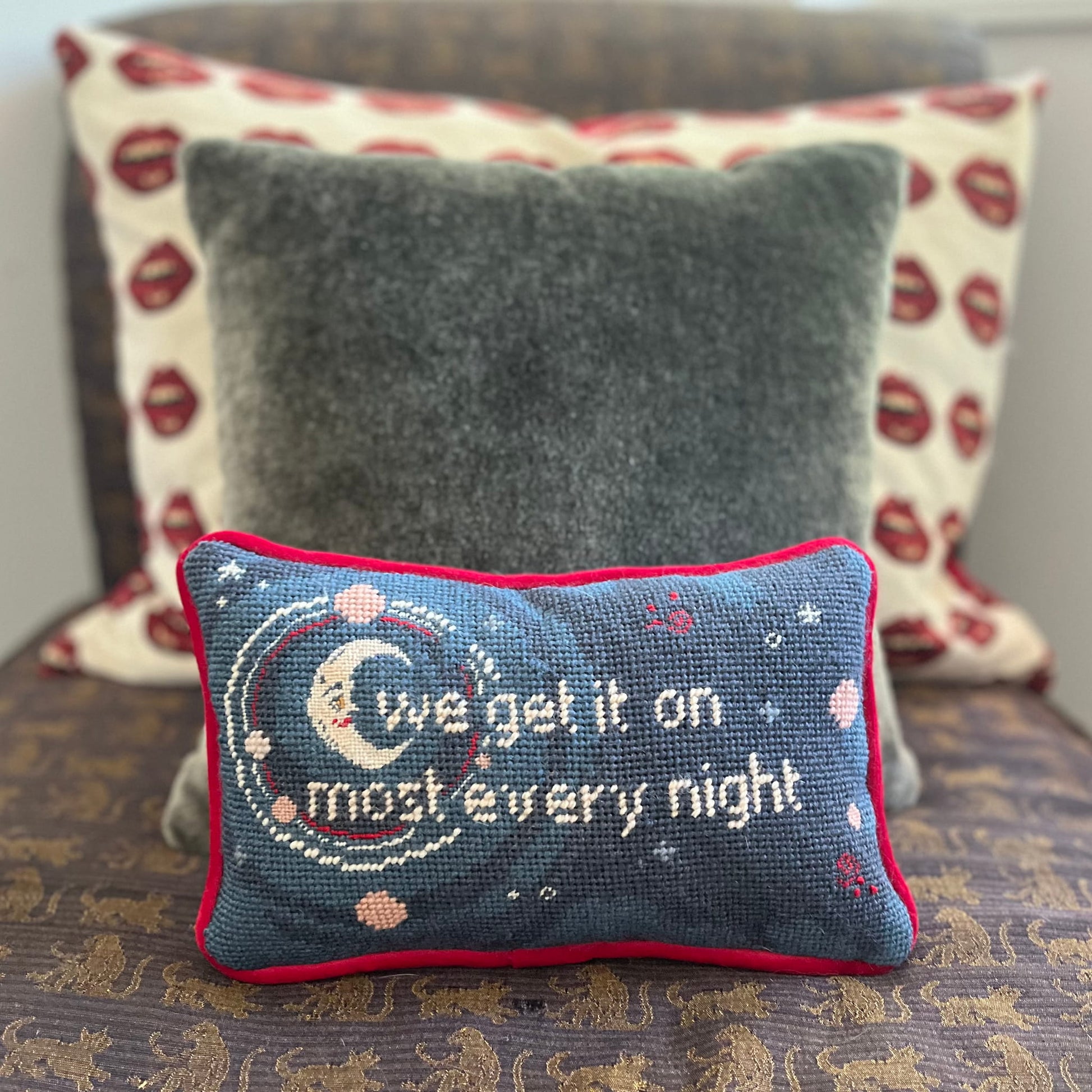 detailed crescent moon with text reading "we get it on most every night" with stars and planets, night time blue shading