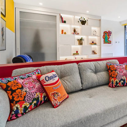 Cheetos pillow with crunchy logo and Chester - looks like a bag of Cheetos