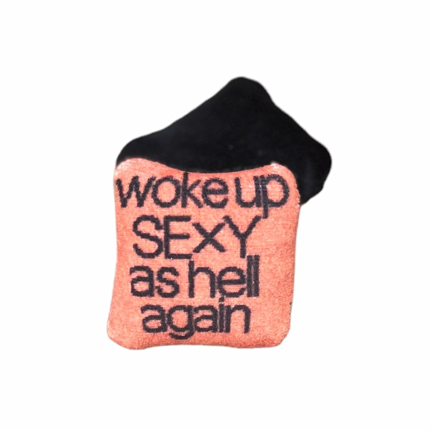 woke up sexy as hell again centered on pillow in black text with copper background