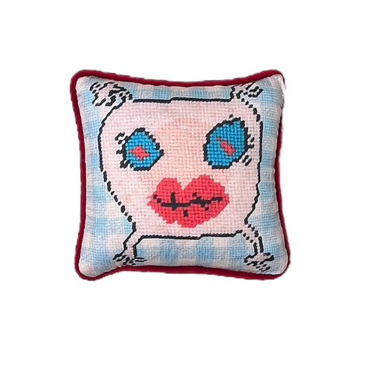 sweet monster pillow with big blue eyes & big red lips on baby blue checked background