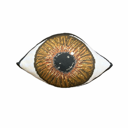 brown eye sculpted pillow has iris is gold at center, gradually turning to a dark brown - very detailed