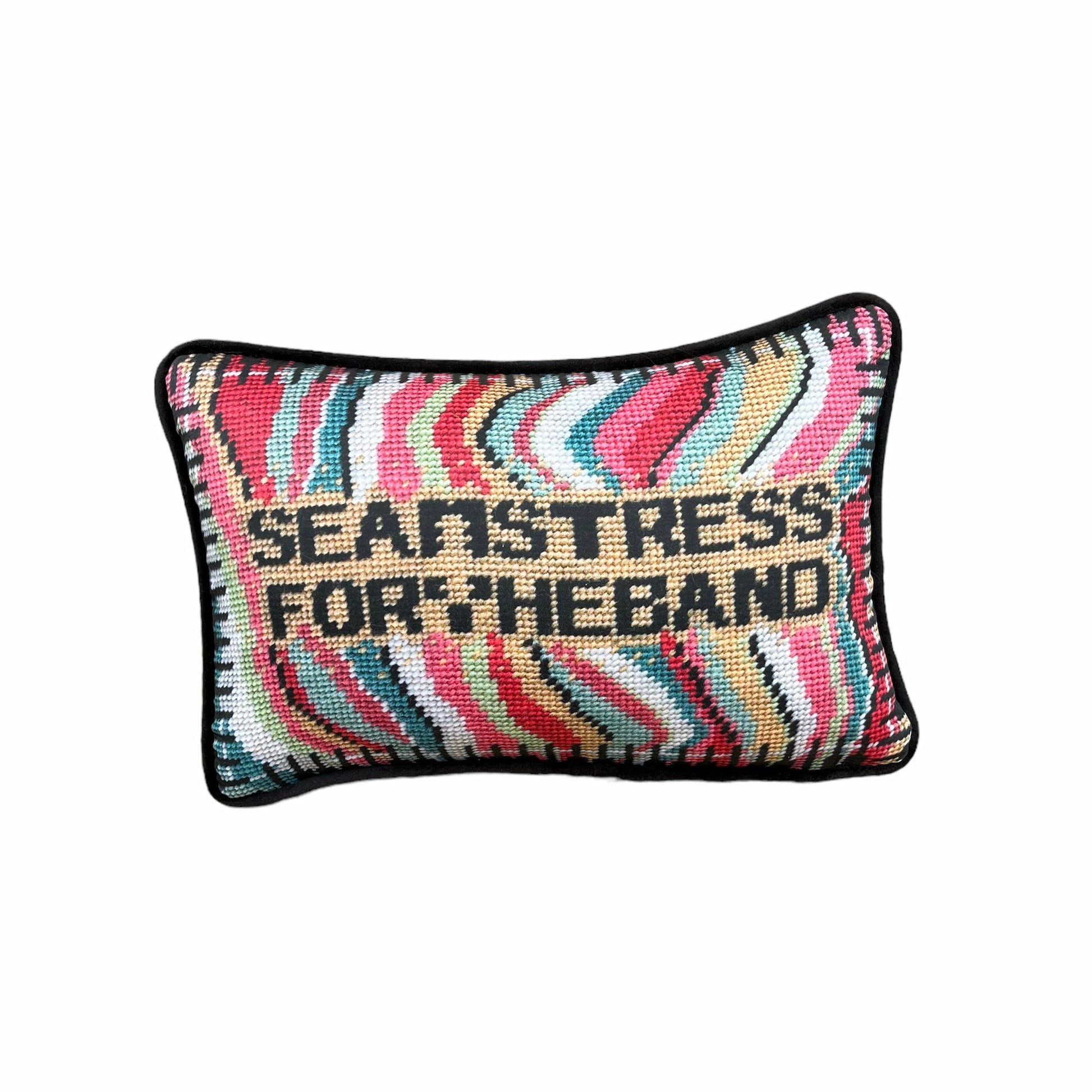 SEAMSTRESS FOR THE BAND black letters inside tan box, surrounded by wavy bands of turquoise, pink, red, white, lime and a keyboard border