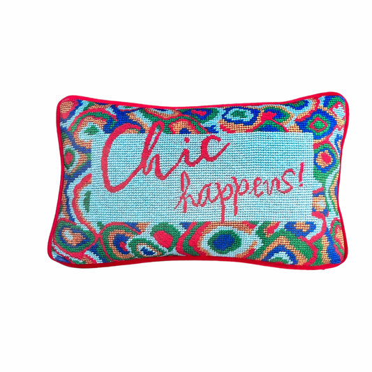 designer velvet pillow reads "Chic Happens" in red on Tiffany blue background with colorful red, green and blue  large paisley border