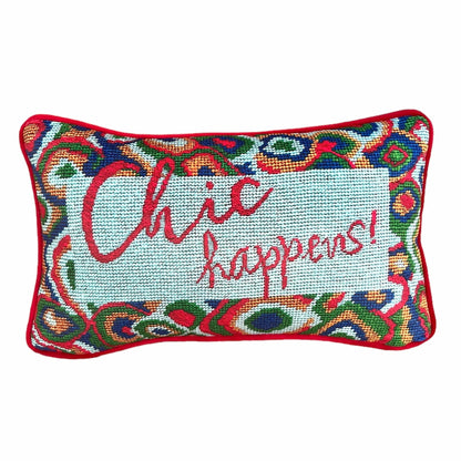 designer velvet pillow reads "Chic Happens" in red on Tiffany blue background with colorful red, green and blue large paisley border