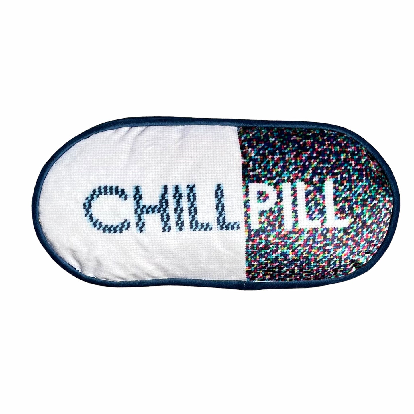 pill shaped pillow with CHILL PILL centered; 1/2 white background and multi-colored dots on the word PILL