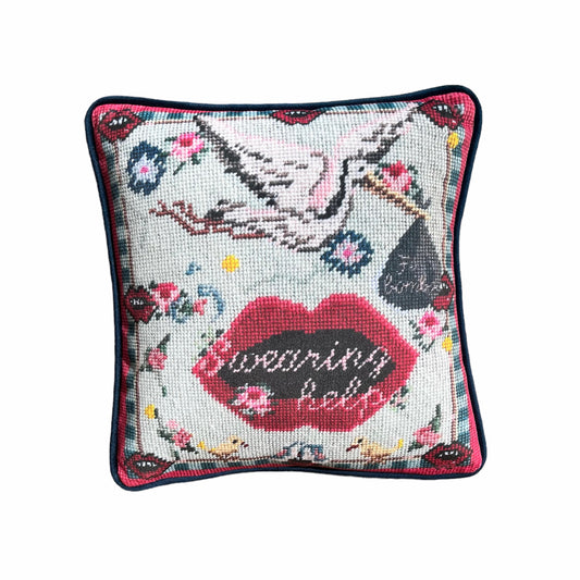 funky pillow with stork carrying f-bombs and big lips