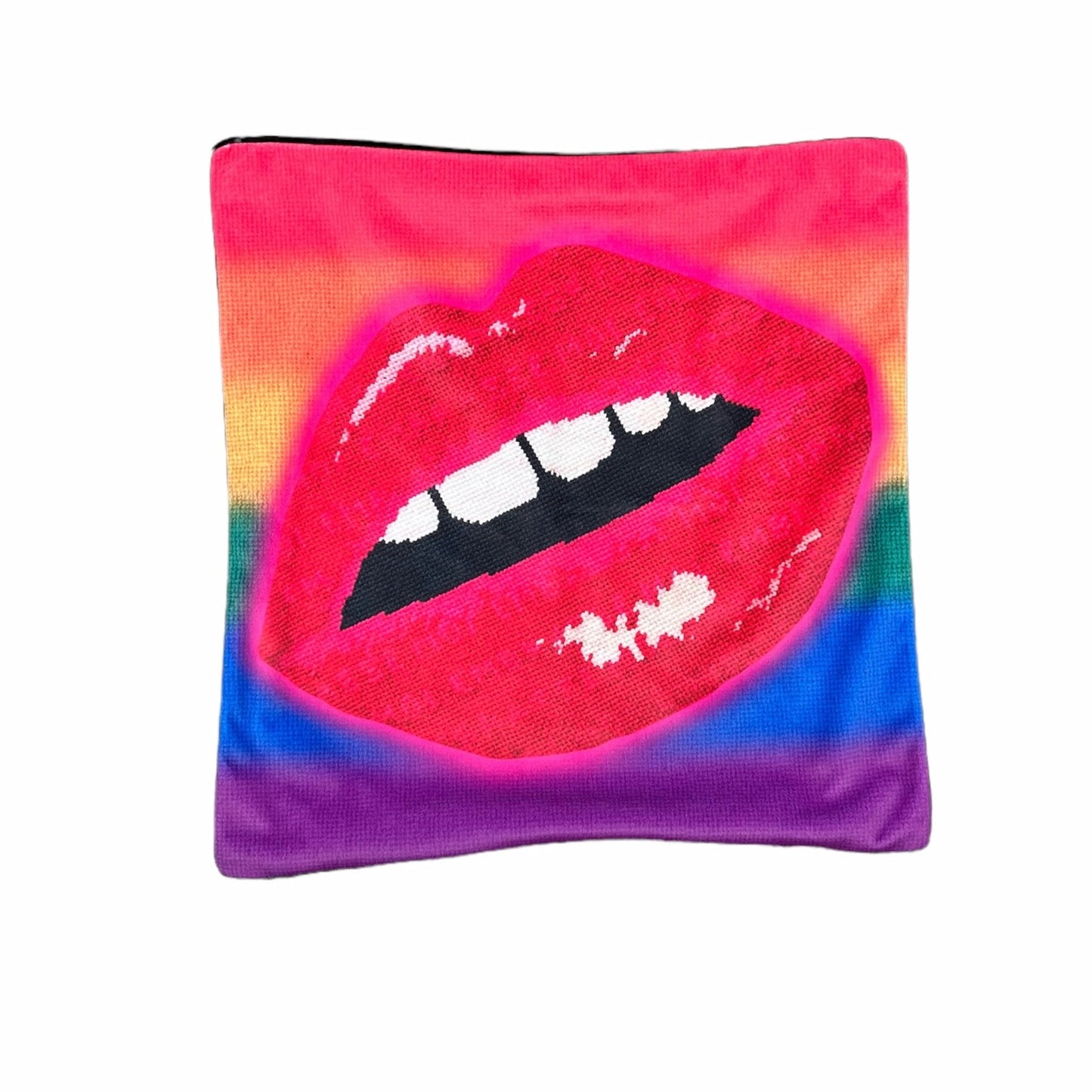 oversized pouty red lips are highlighted in neon pink with a rainbow background