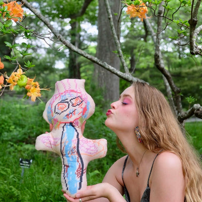 blonde model with abstract monster with big eyes & wild hair