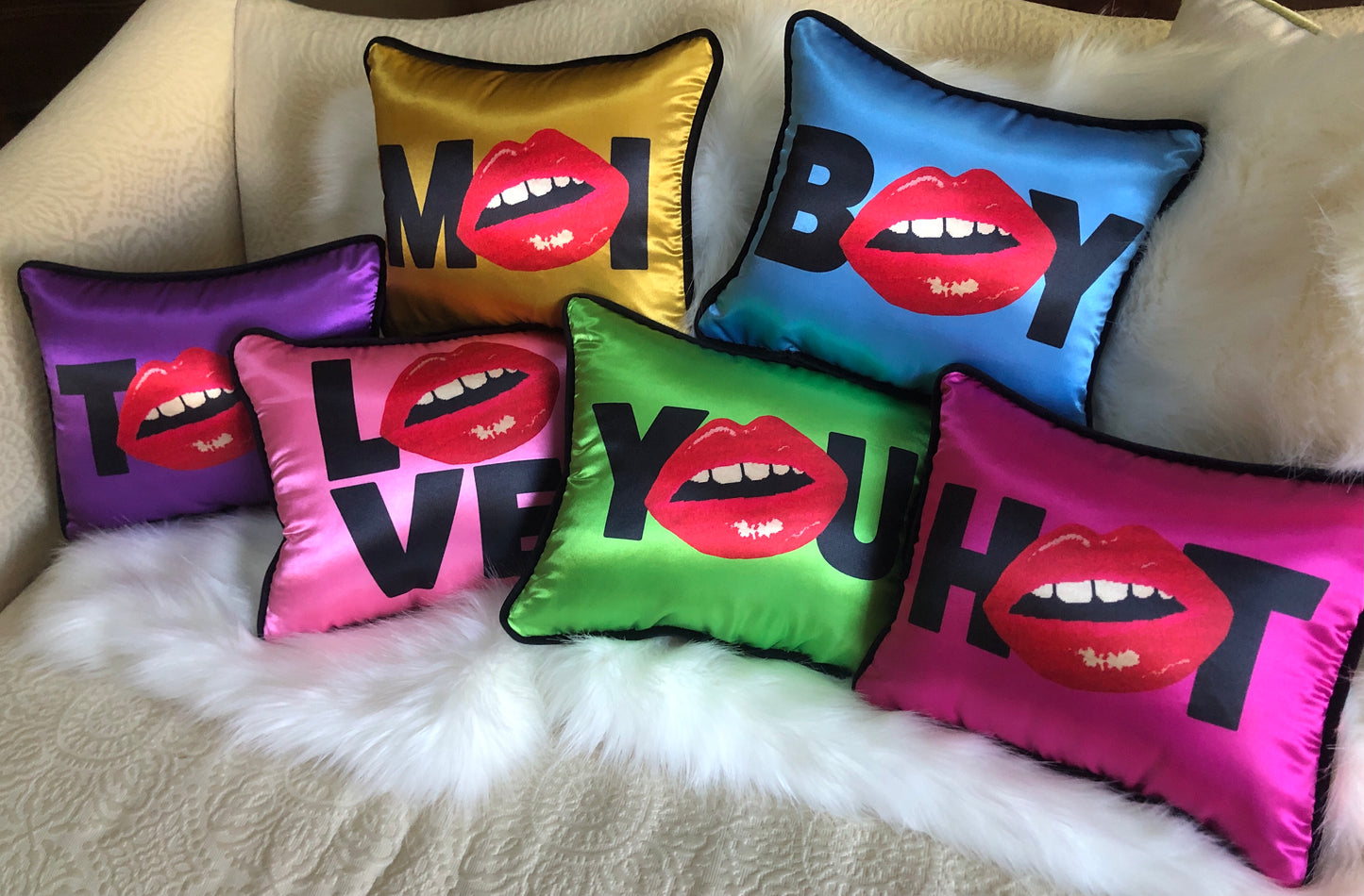 jewel-toned hot pink satin pillow with black HOT and red lips for O