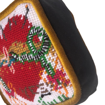 needlepoint kissing snakes on a heart