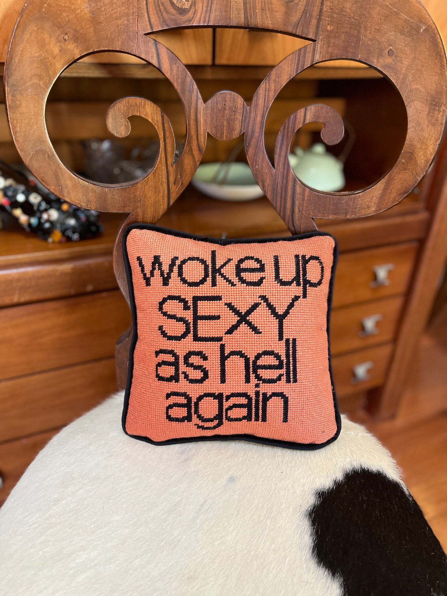 velvet copper pillow with WOKE UP SEXY AS HELL AGAIN black text