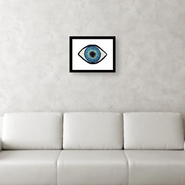 blue eye print has gold in center, turning to turquoise, then deep blues white leather sofa