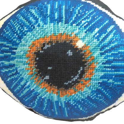 blue eye sculpted pillow has gold in center, turning to turquoise, then deep blues - very detailed