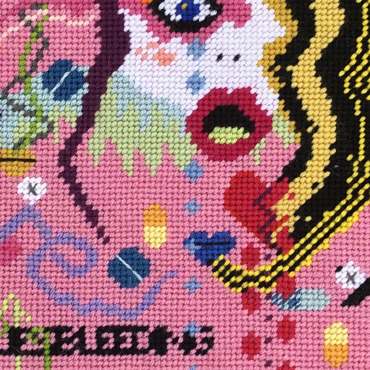 modern woman's face with mouth open;  a smattering of cool snakes with lips; pills; XO .  Super colorful pink velvet background with lots of blues, greens, red hearts.  Super fun pop art!