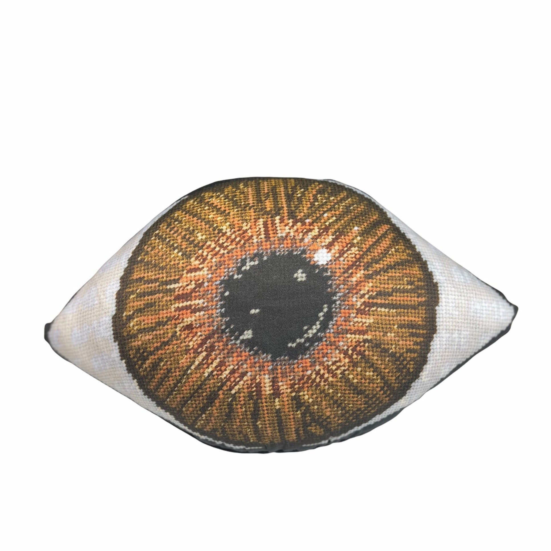 brown eye sculpted pillow has iris is gold at center, gradually turning to a dark brown - very detailed