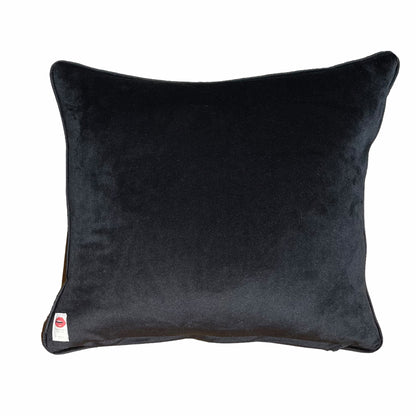 hand-embroidered lyrical pillow is covered in whimsical eyes of varying colors; vertigo band white swirl border