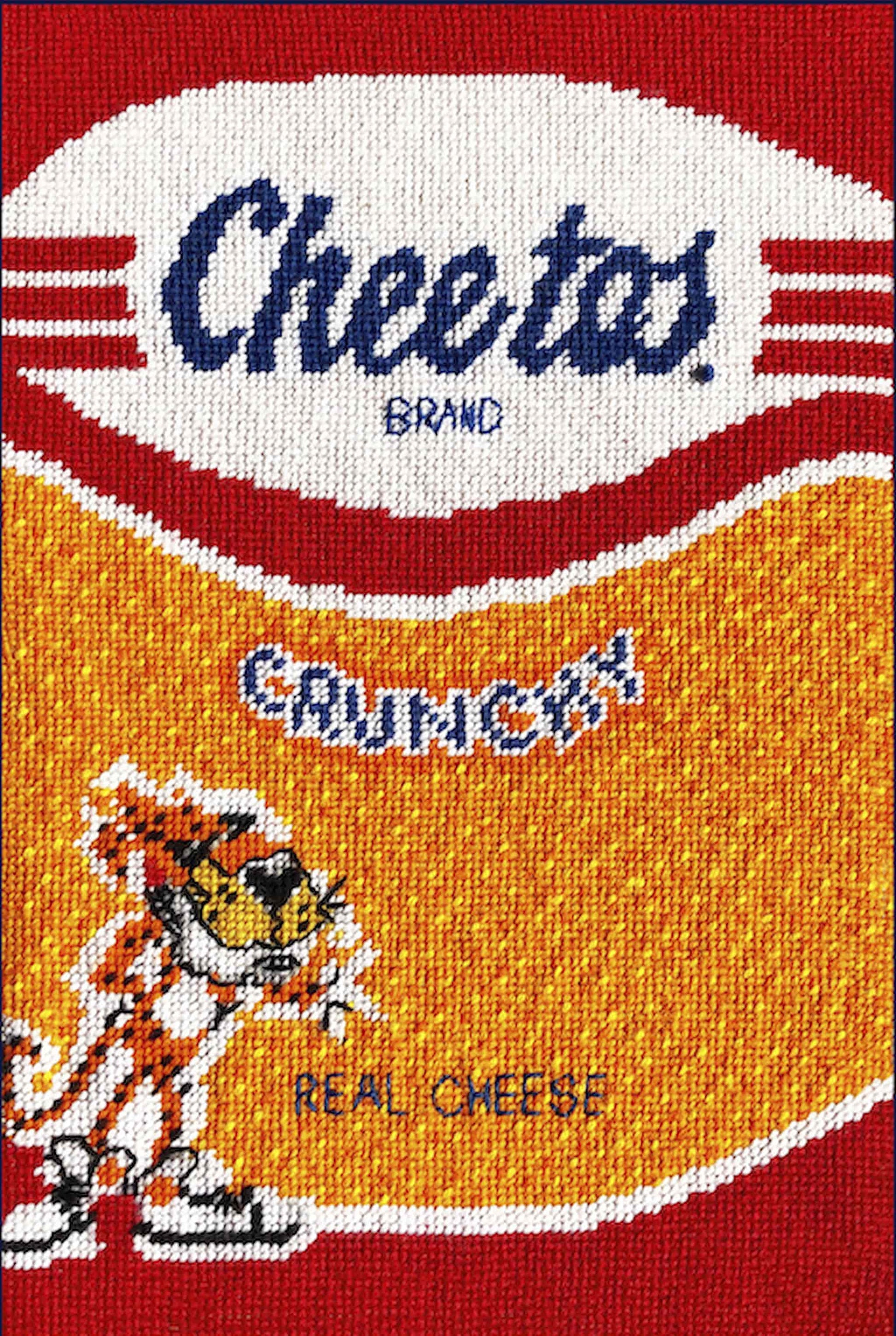 Tea towel with Cheetos crunchy logo and Chester - looks like a bag of Cheetos