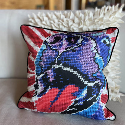 Americana style purple dog big pillow with big smile & tongue falling out, red & white diagonal background