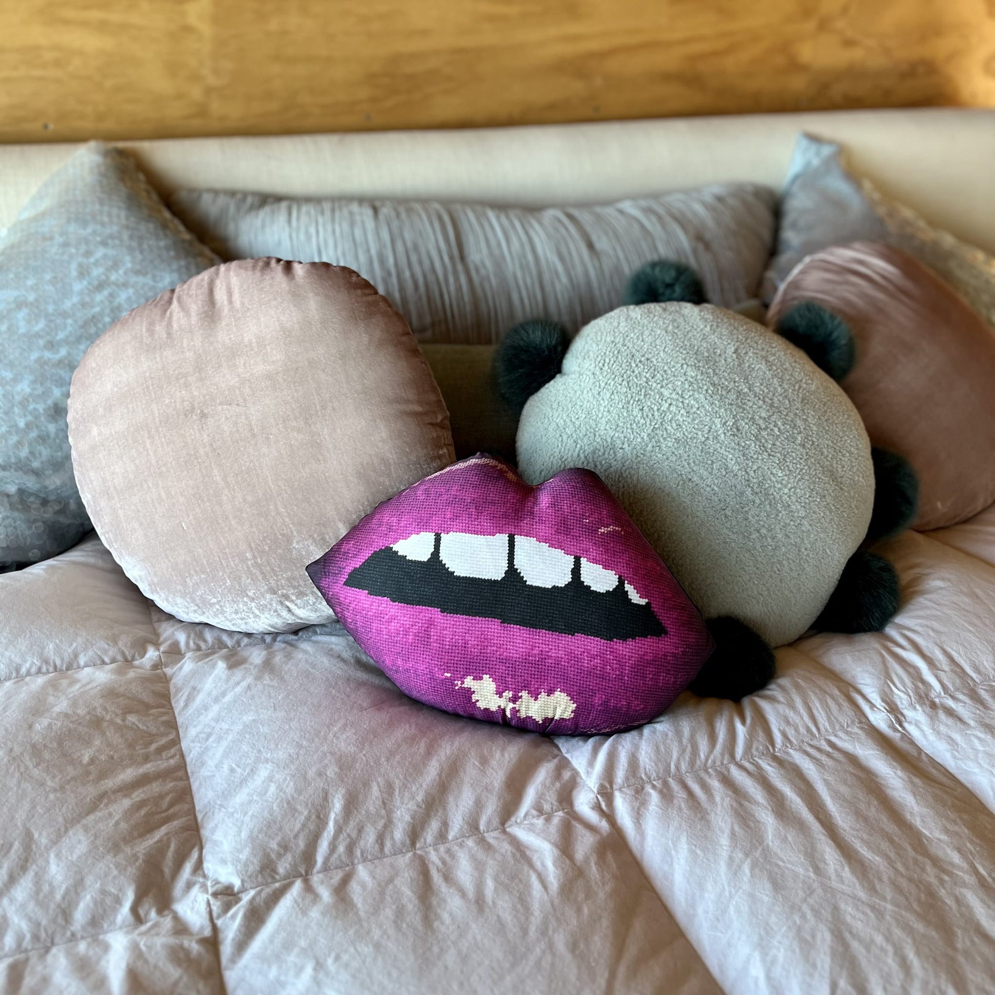 Sculpted magenta lips pillow with open mouth & gapped teeth. Featured on Disney+ High School Musical The Serie
