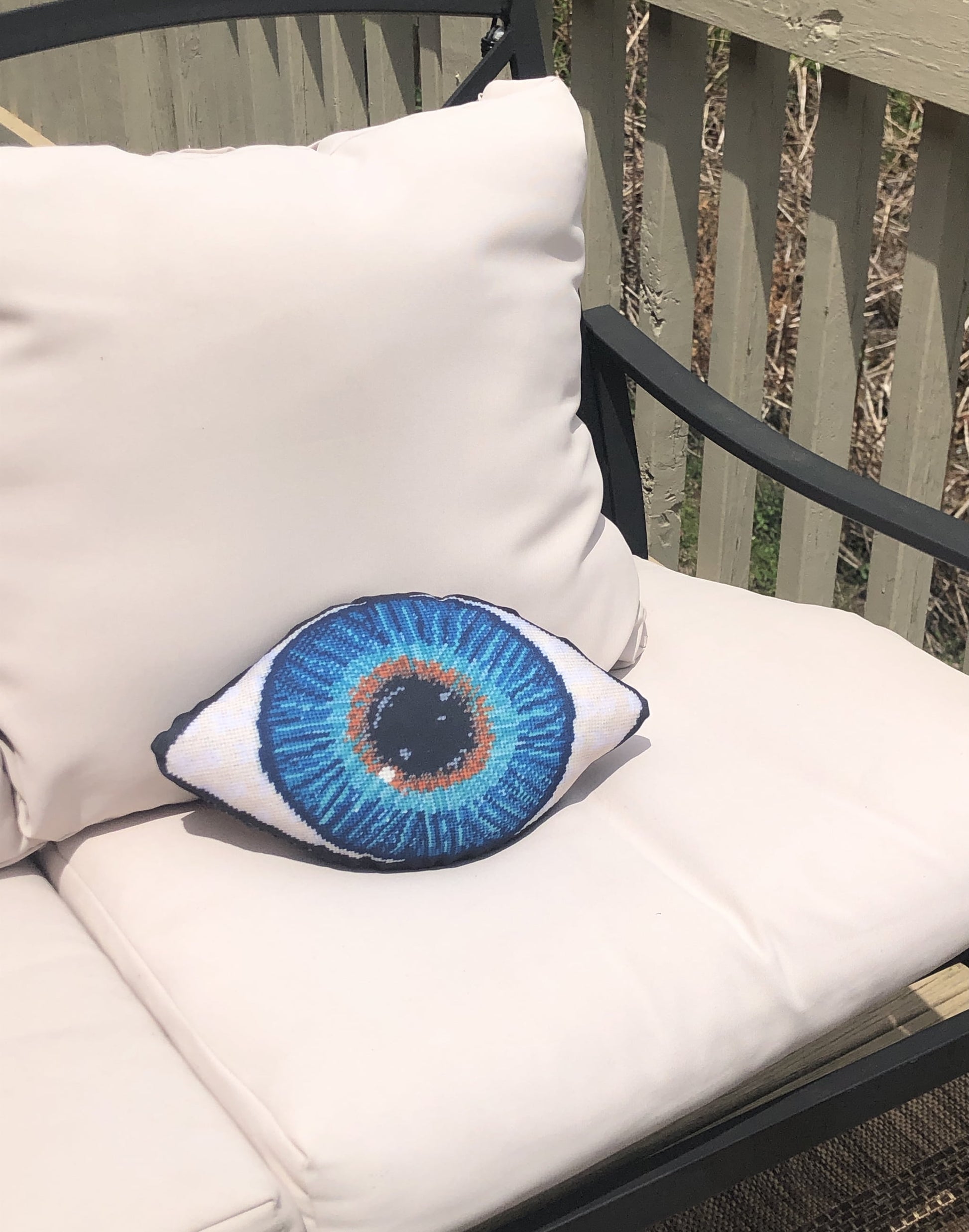 blue eye sculpted water-resistant outdoor pillow double sided