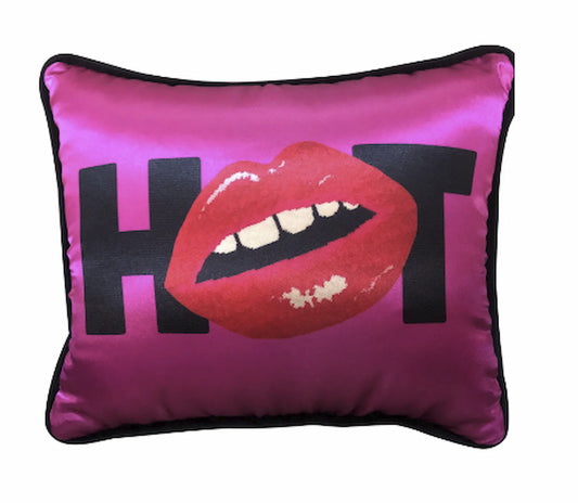 magenta satin pillow with HOT written in black letters and the O is  red lips