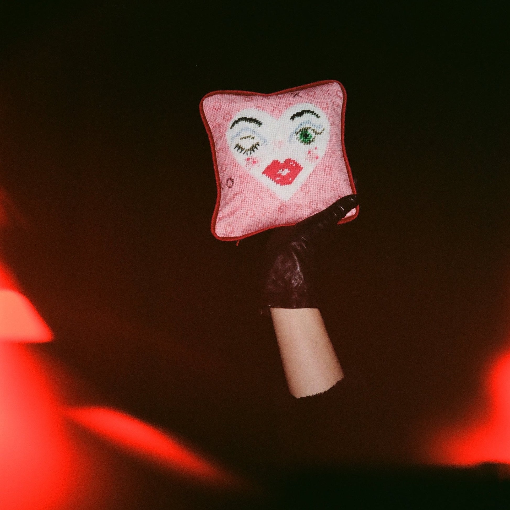 pink velvet lavender pillow with with heart face, winking, green eye & full lips