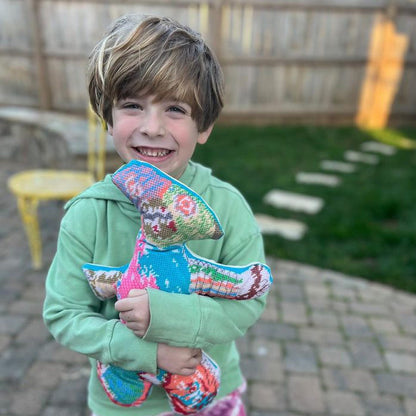colorful, silly sculpted soft plush monster