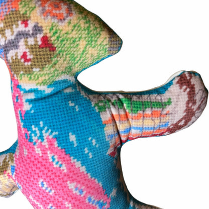 colorful, silly sculpted soft plush monster