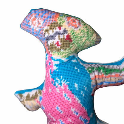 colorful, silly sculpted soft plush monster